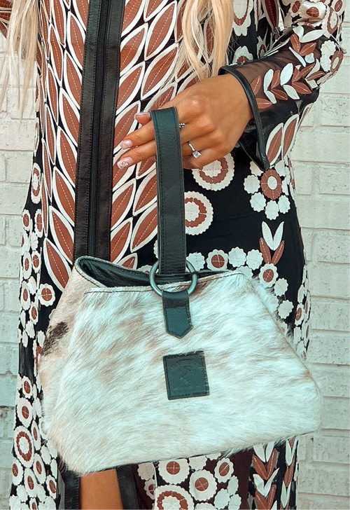 Hair On Hide Sak Bag-Handbags-Rafter T Ranch Company-Brown and White Hide-Inspired Wings Fashion